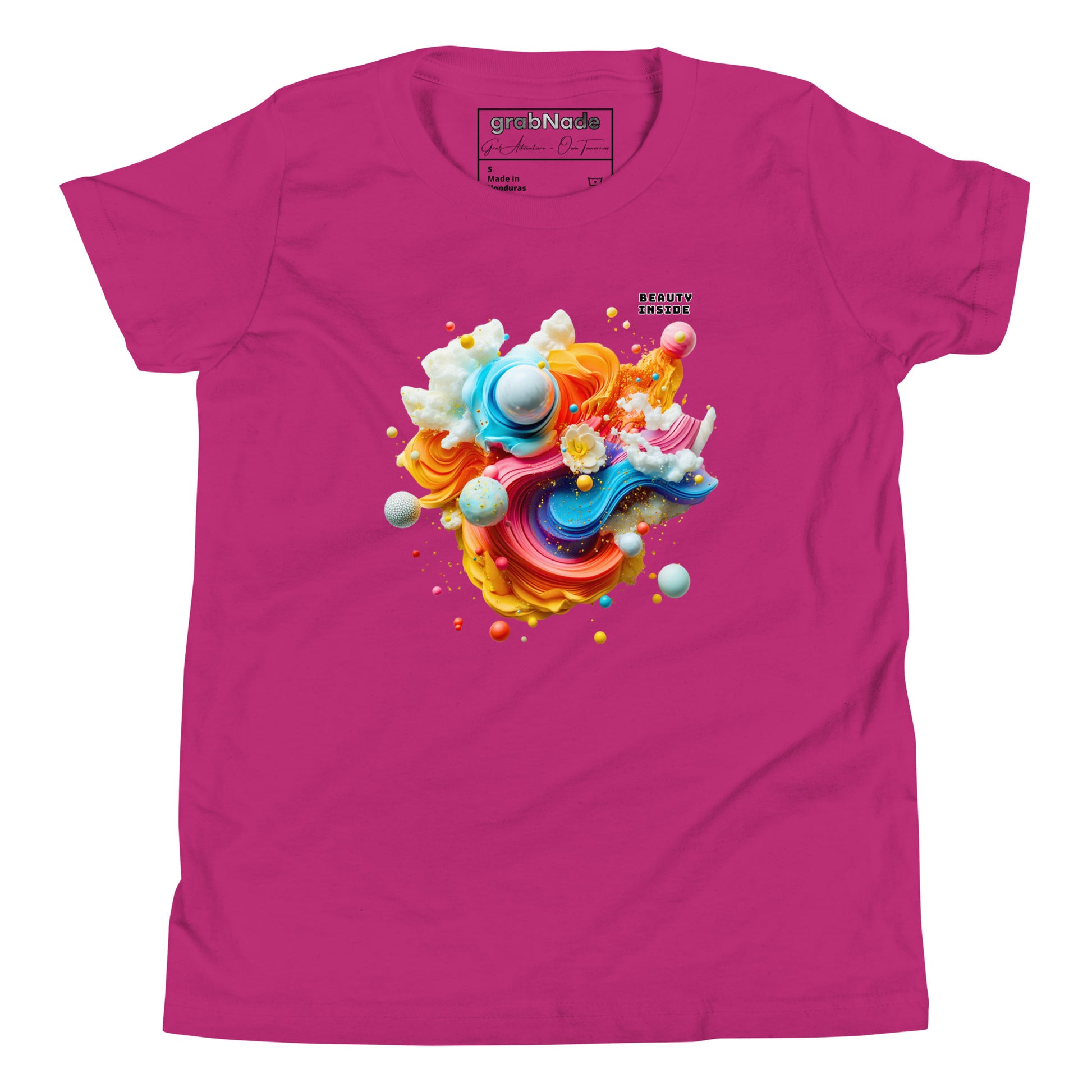 Product mockup. A pink t-shirt featuring an abstract, swirling art design at the center with vibrant strokes of yellow, orange, blue, and pink, adorned with playful 3D spheres, clouds, and flowers. Near the top right of the design, black block text reads, 'BEAUTY INSIDE.