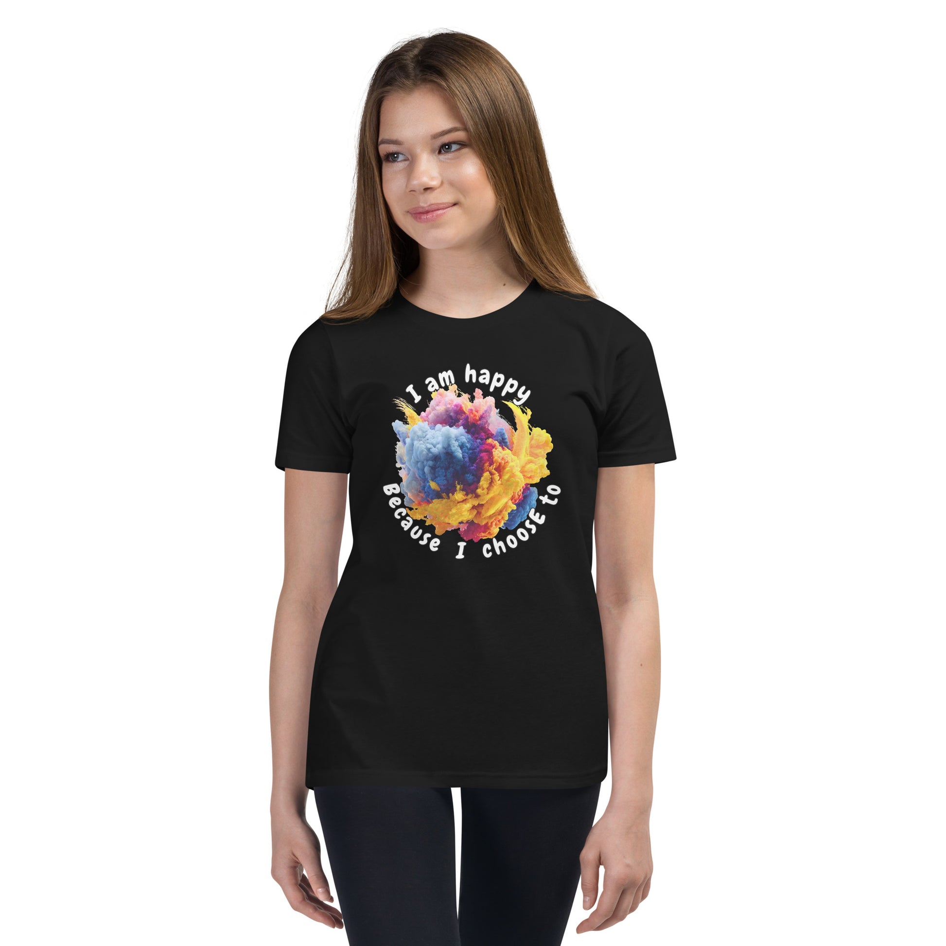 Product mockup. Ultra-soft premium black t-shirt featuring vibrant multicolor abstract explosion graphic with text 'I am happy Because I choose to' printed in curved style around the design, modeled on young woman.