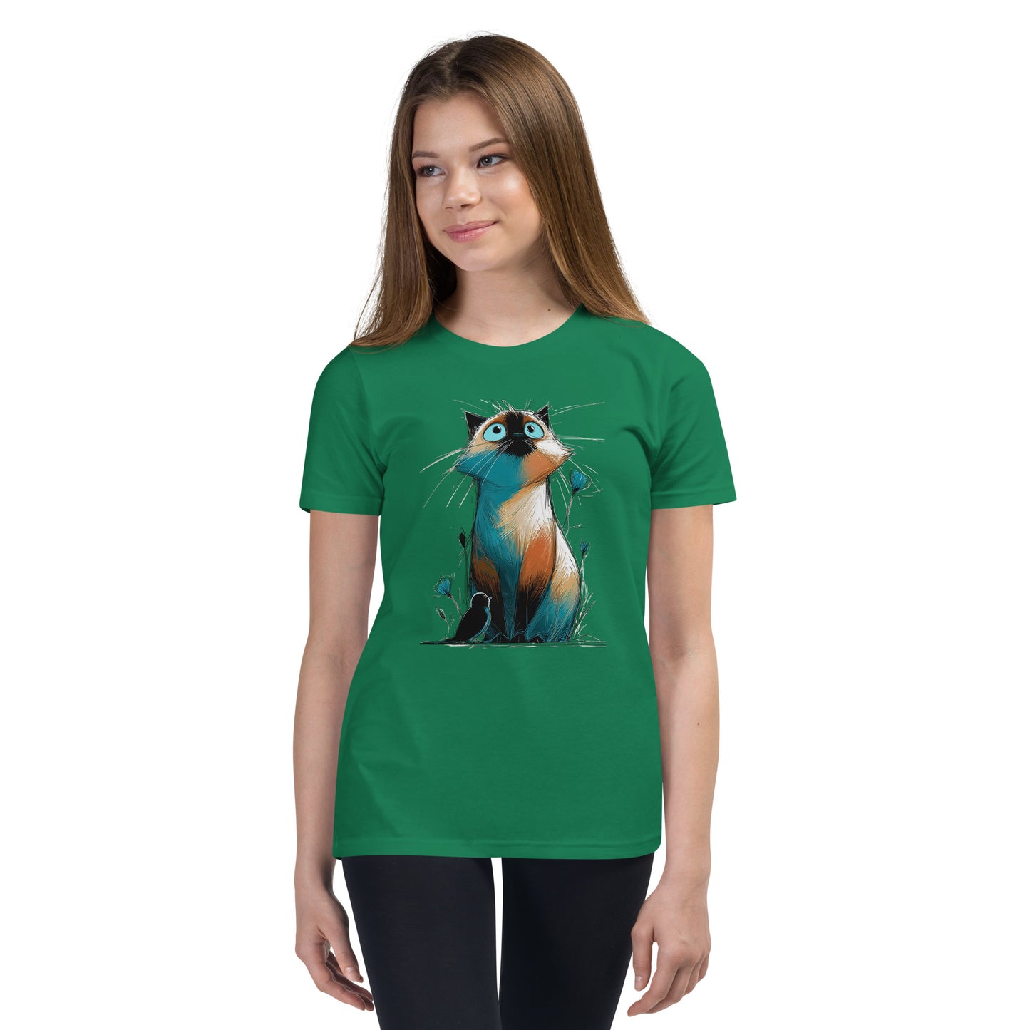 Product mockup. Ultra-soft premium youth green t-shirt featuring colorful artistic drawing of a wide-eyed cat sitting beside flowers and a black bird, modeled on young girl.