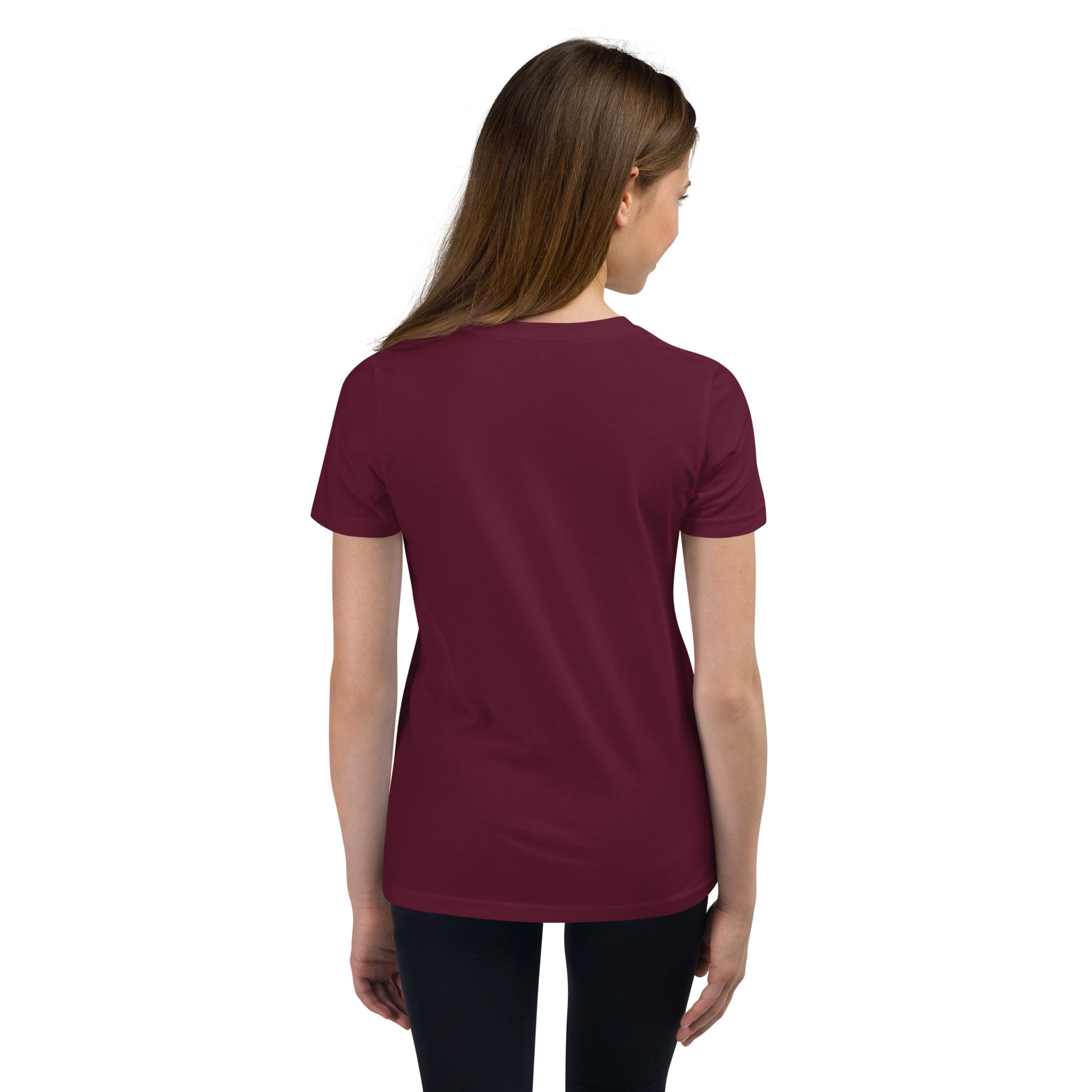 Product mockup. A girl shown from behind wearing a plain maroon, short-sleeve, fitted t-shirt and black leggings. Her straight brown hair falls over her shoulders, and the back of the shirt has no visible design or graphics.
