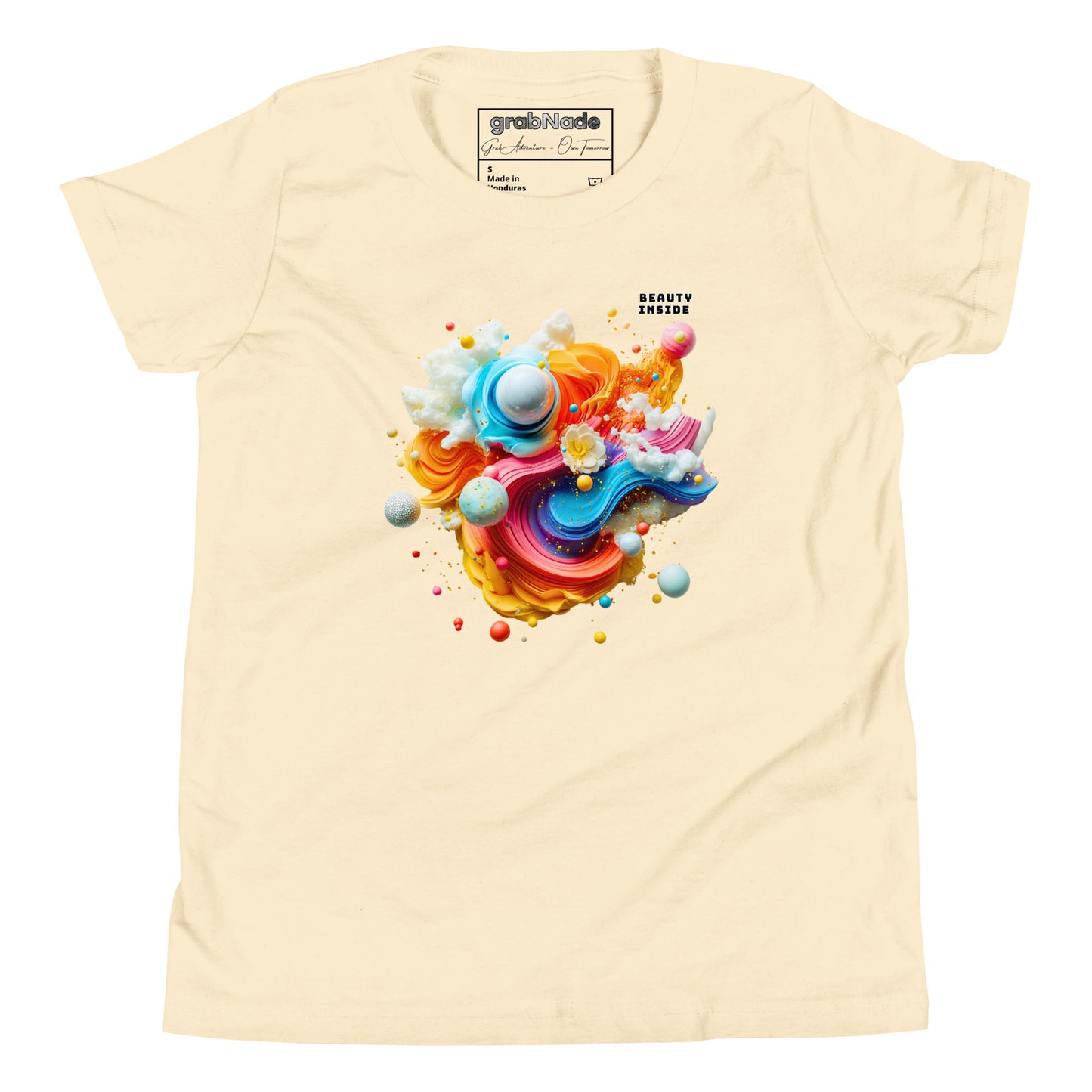Product mockup. A beige t-shirt featuring an abstract, swirling art design at the center with vibrant strokes of yellow, orange, blue, and pink, adorned with playful 3D spheres, clouds, and flowers. Near the top right of the design, black block text reads, 'BEAUTY INSIDE.
