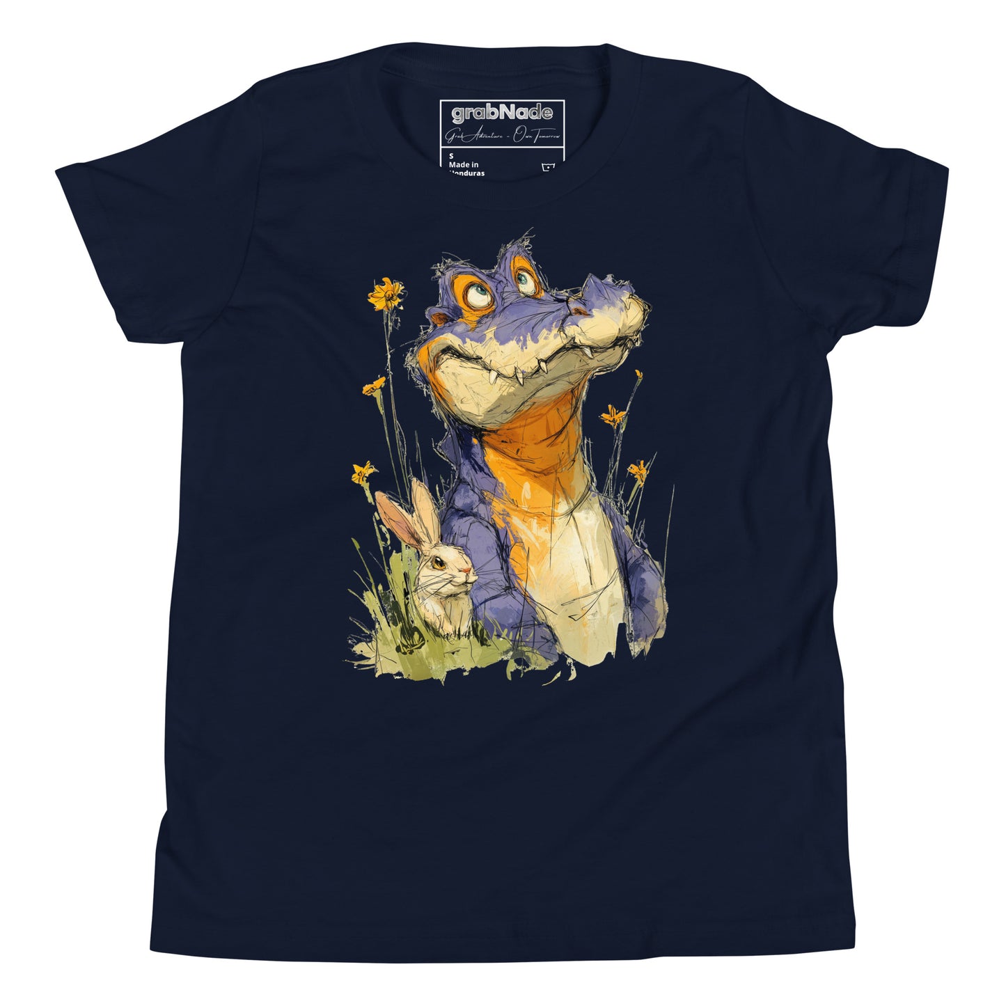 Product mockup. A playful, sketch-style illustration of a cheerful purple alligator with bright orange accents sitting in tall grass and wildflowers, accompanied by a white rabbit nestled by its side. Both characters feature expressive faces and are set against a plain navy-blue t-shirt background, creating a whimsical and friendly scene.