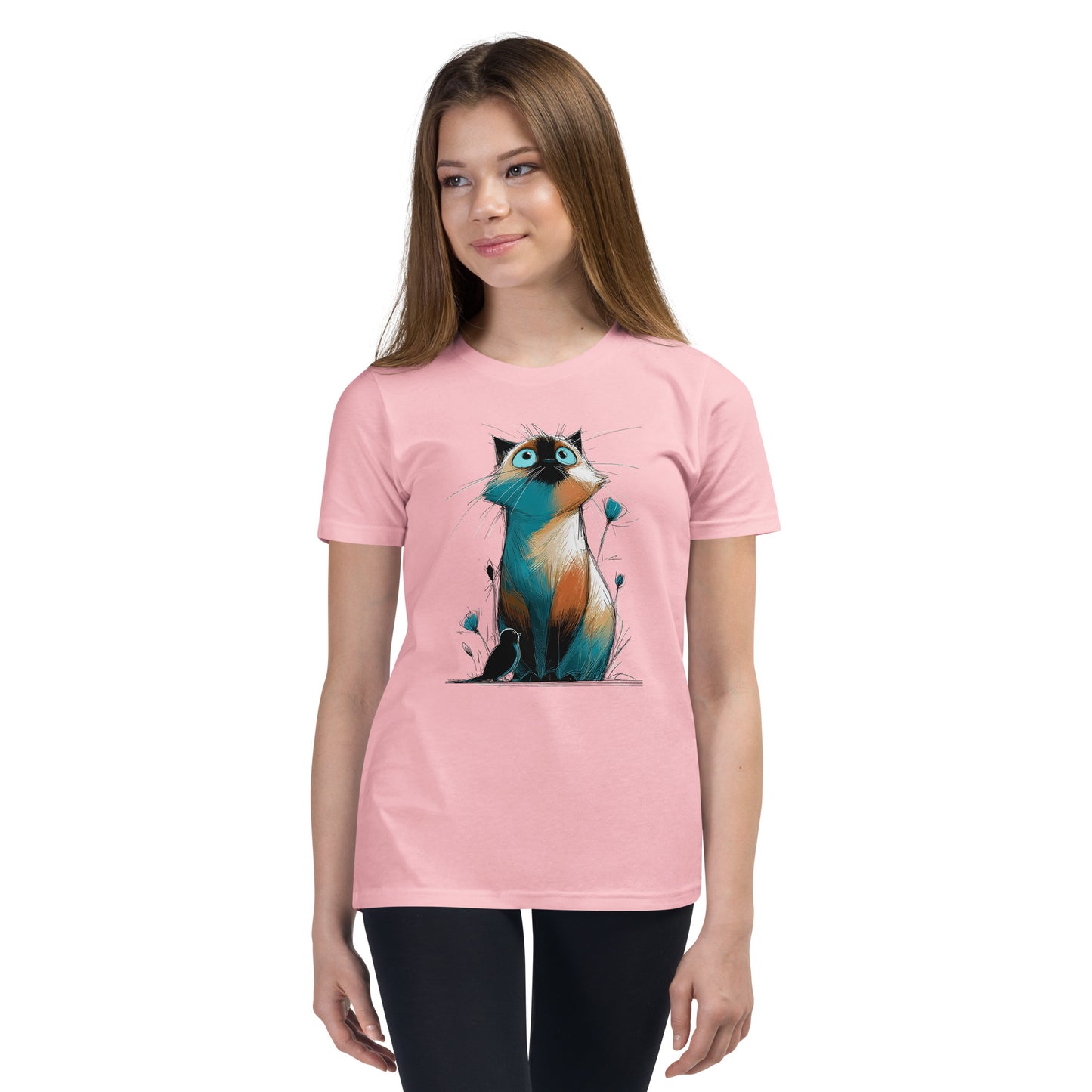 Product mockup. Ultra-soft premium youth pink t-shirt featuring colorful artistic drawing of a wide-eyed cat sitting beside flowers and a black bird, modeled on young girl.