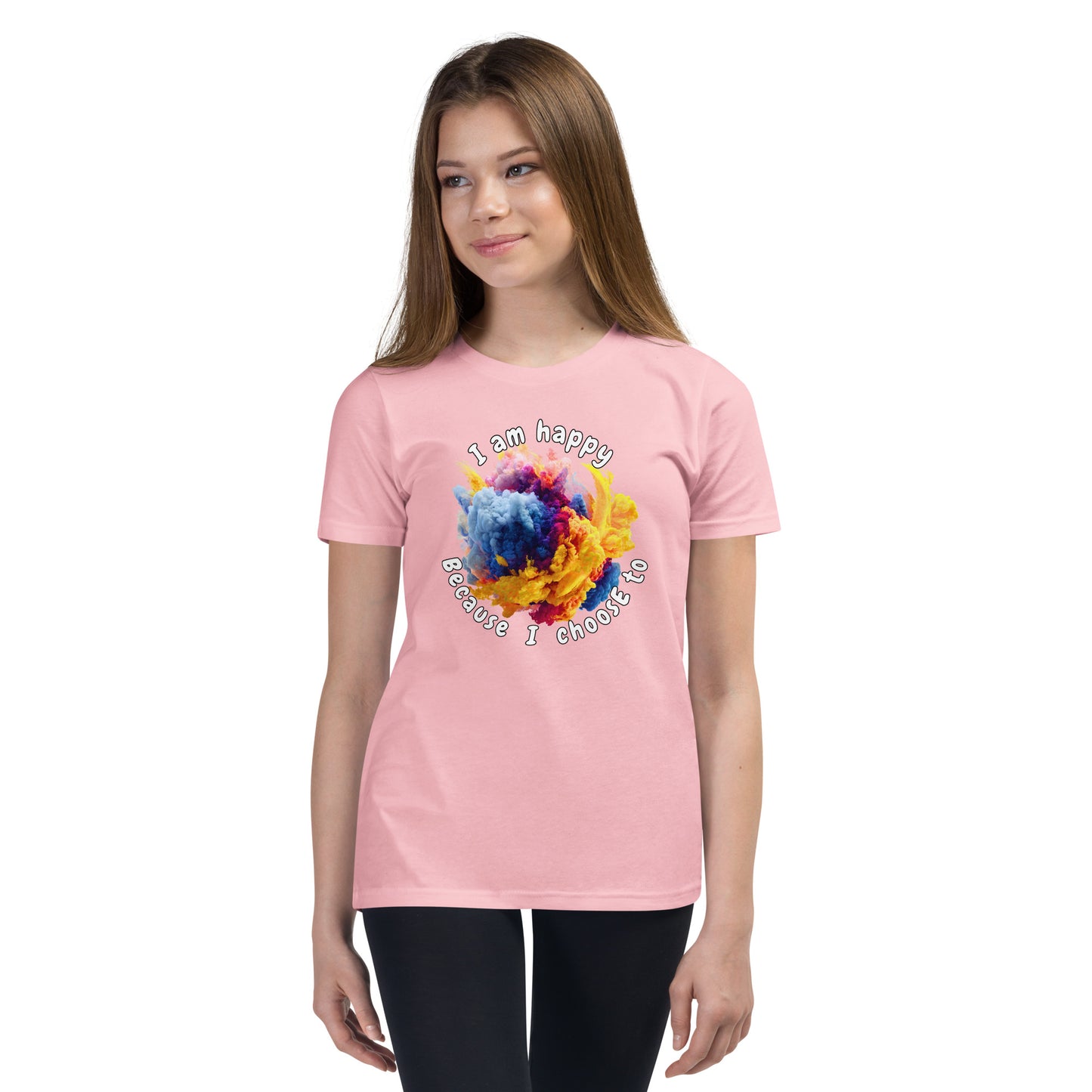 Product mockup. Ultra-soft premium light pink t-shirt featuring vibrant multicolor abstract explosion graphic with text 'I am happy Because I choose to' printed in curved style around the design, modeled on young woman.