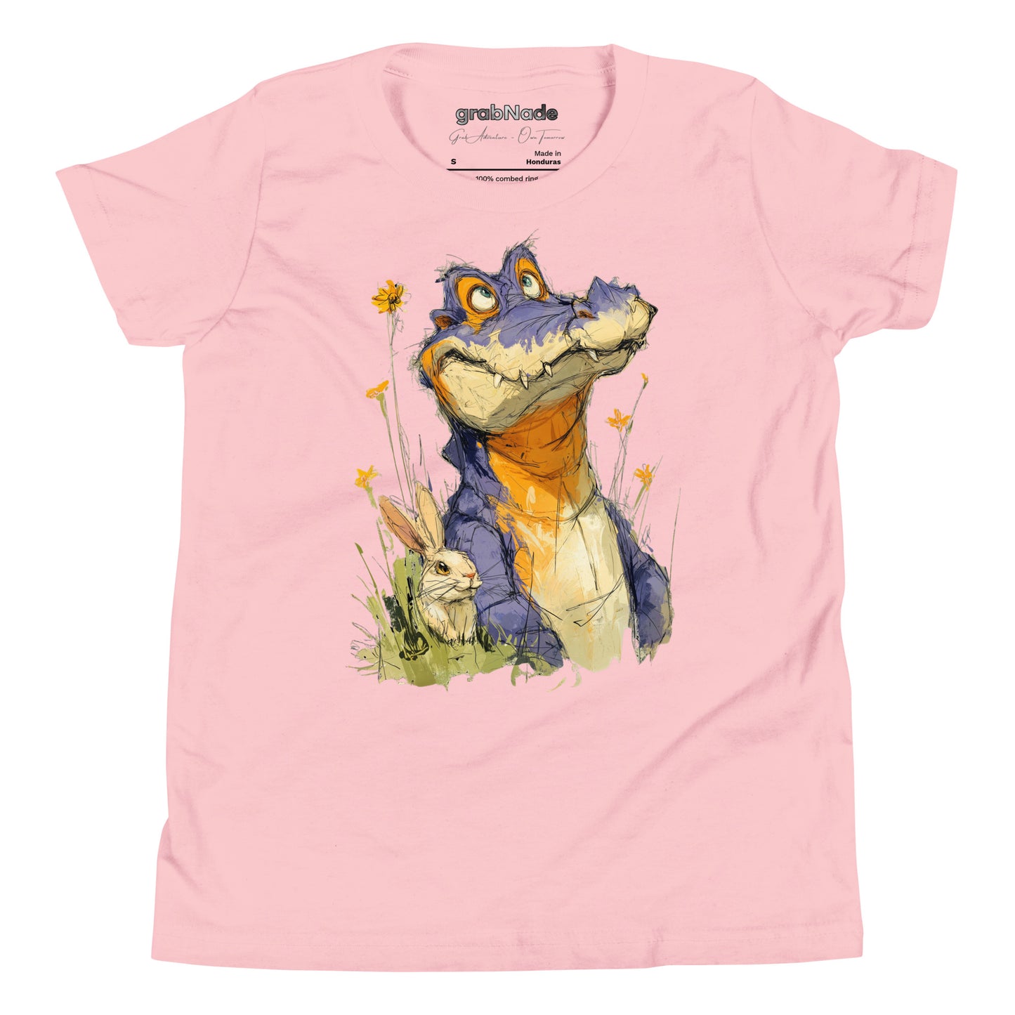 Product mockup. A playful, sketch-style illustration of a cheerful purple alligator with bright orange accents sitting in tall grass and wildflowers, accompanied by a white rabbit nestled by its side. Both characters feature expressive faces and are set against a plain light pink t-shirt background, creating a whimsical and friendly scene.