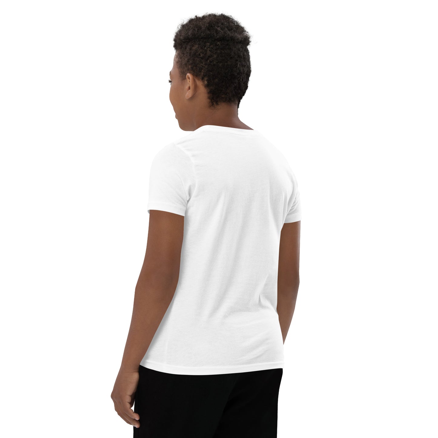Product mockup. A boy shown from behind wearing a plain white, short-sleeve t-shirt and black pants. His curly hair is closely cropped, and the back of the shirt is blank with no visible design or graphics.
