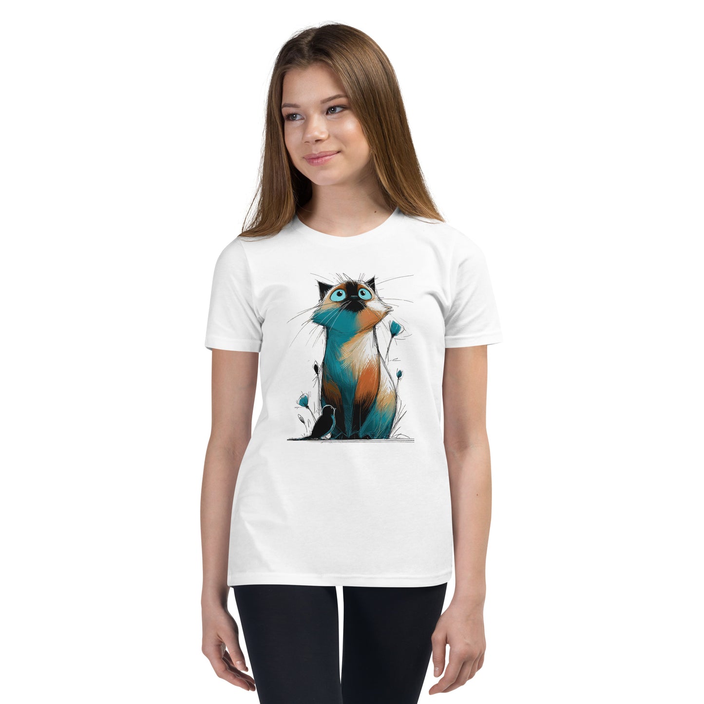 Product mockup. Ultra-soft premium youth white t-shirt featuring colorful artistic drawing of a wide-eyed cat sitting beside flowers and a black bird, modeled on young girl.